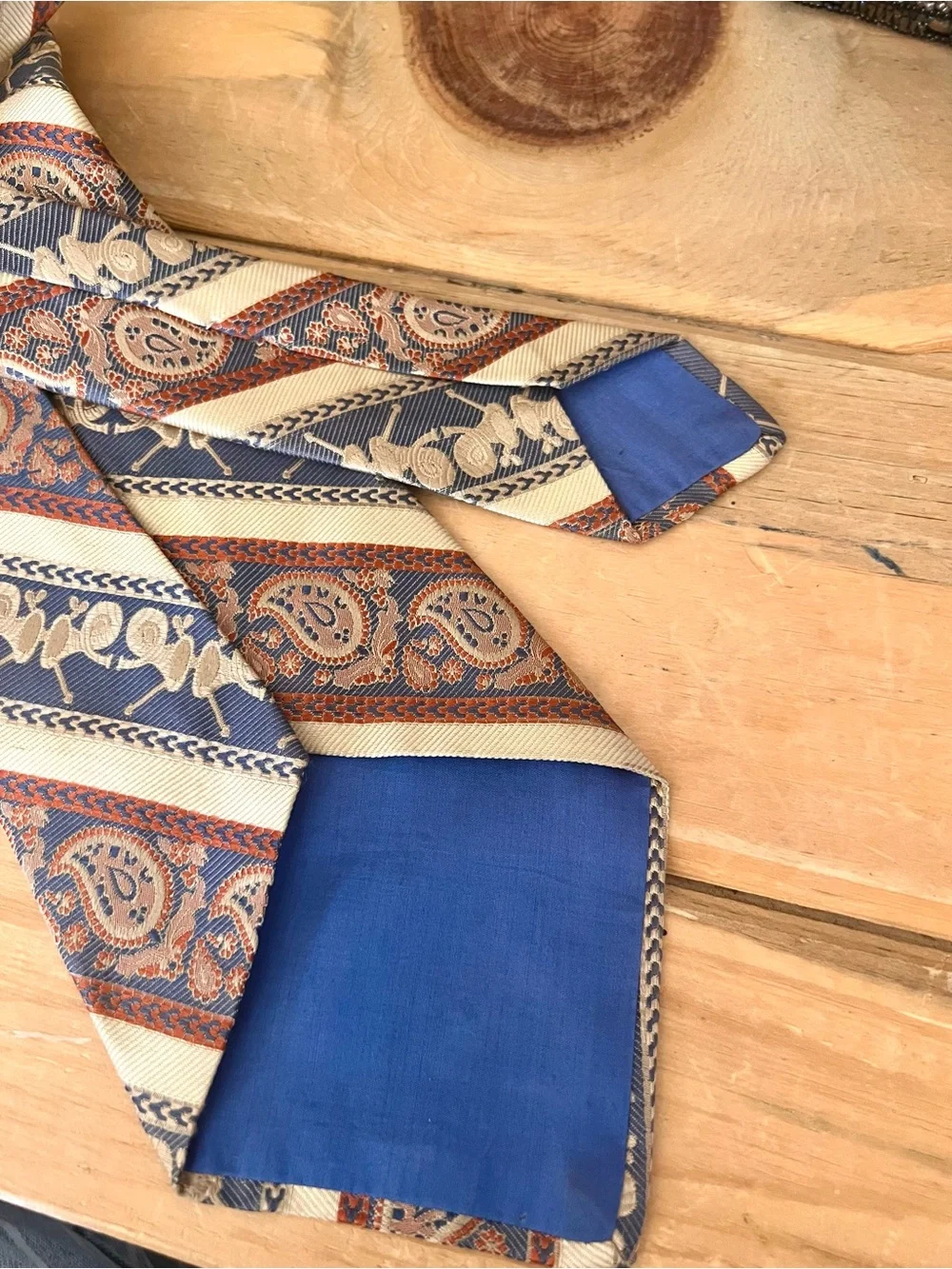 1970’s vintage abstract patterned necktie featuring a geometric stripe and swirl